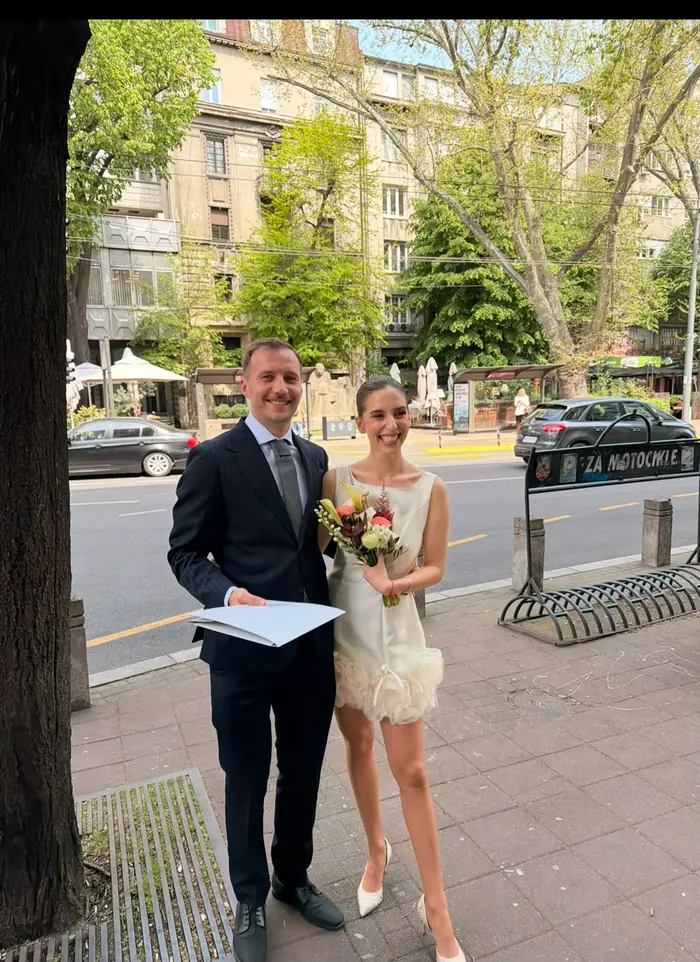 Patricia and Nenad just married, outside the registry office